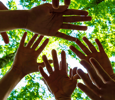 Hands with threes in the background